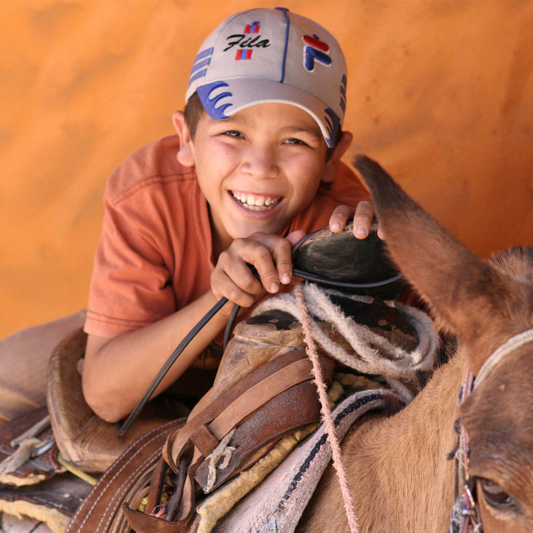 Mexican boy rides a horse in El Quelite Sinaloa Mexico