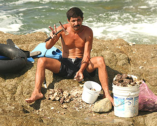Pescador de playa Los Pinos